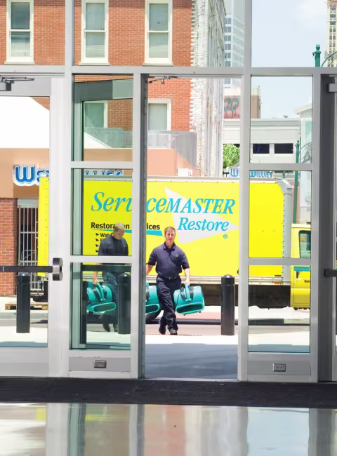 commercial building entrance ServiceMaster Restore truck