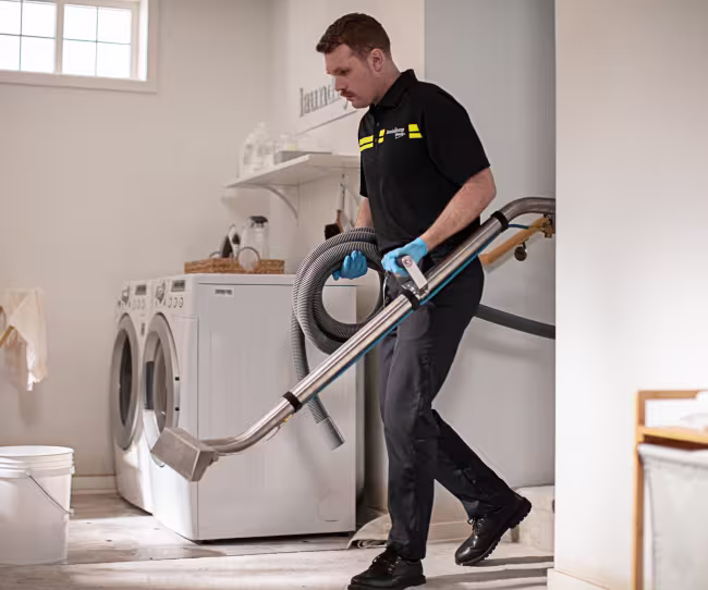 servicemaster restore setting up industrial vacuum for water damage mitigation
