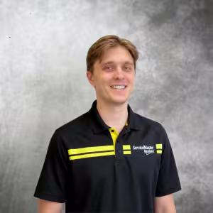 Man in black and yellow polo