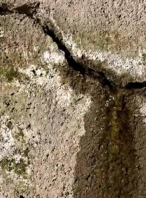 cracked slab with water leaking