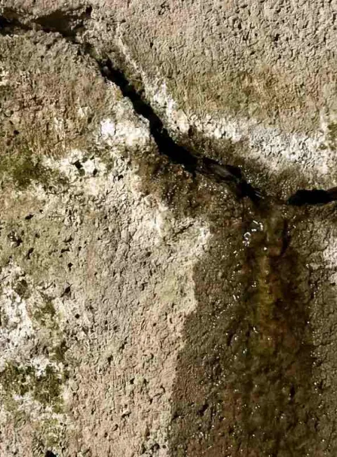 cracked slab with water leaking