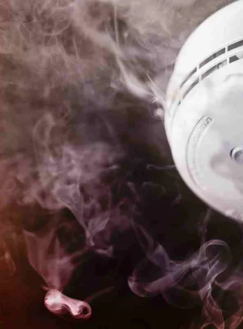 smoke alarm surrounded by smoke