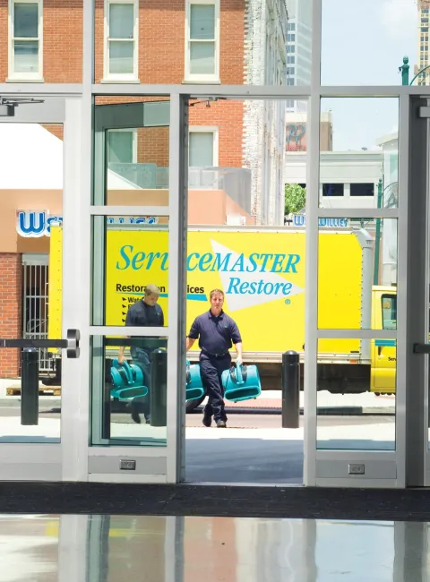 commercial building entrance ServiceMaster Restore truck