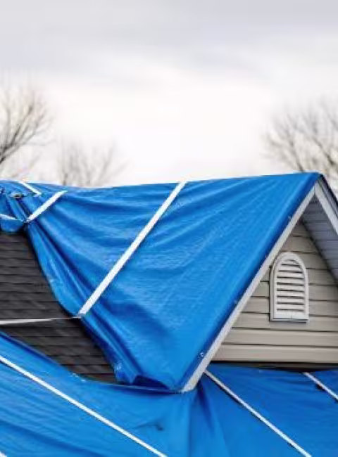 Tarping and board-up services after an OKC disaster