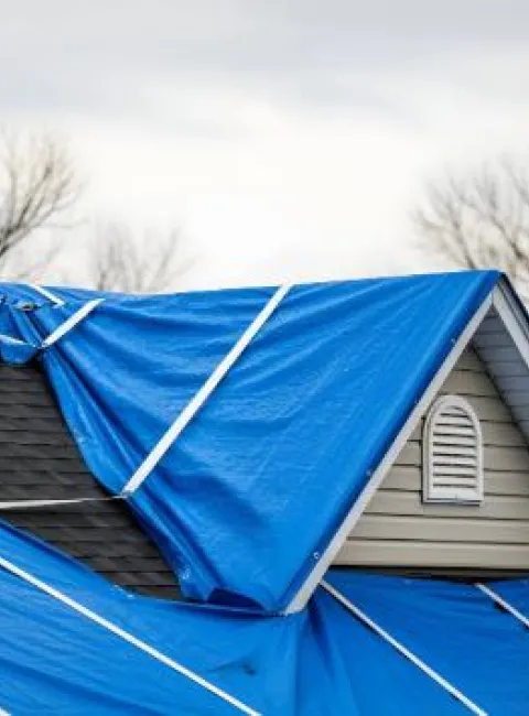 Tarping and board-up services after an OKC disaster