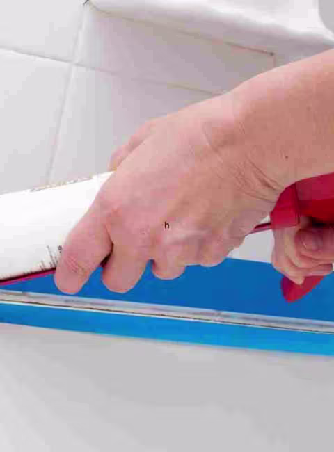 caulking bathroom tile