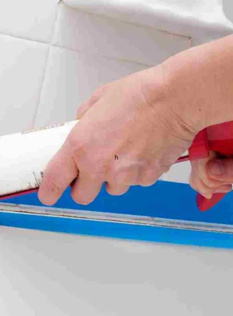 caulking bathroom tile