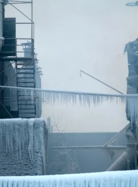 Commercial building frozen over due to snow load dangers