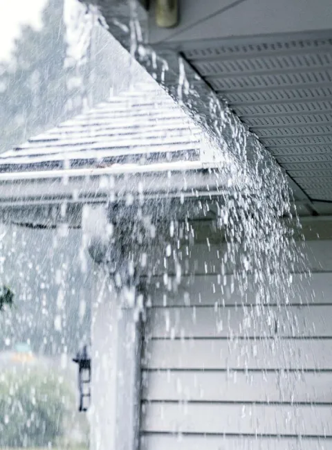 Water overflowing from gutter due to excessive rain