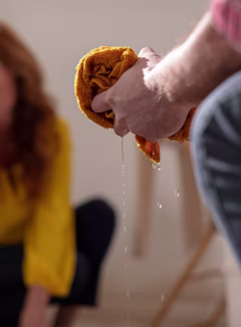 homeowners cleaning water damage