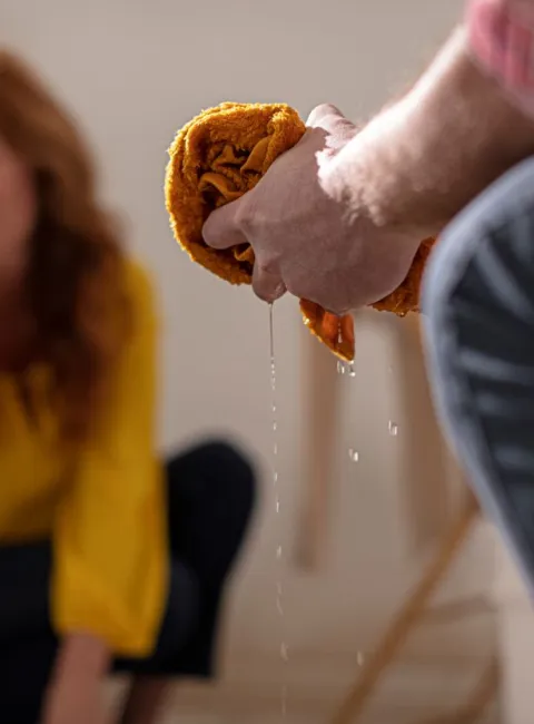 homeowners cleaning water damage