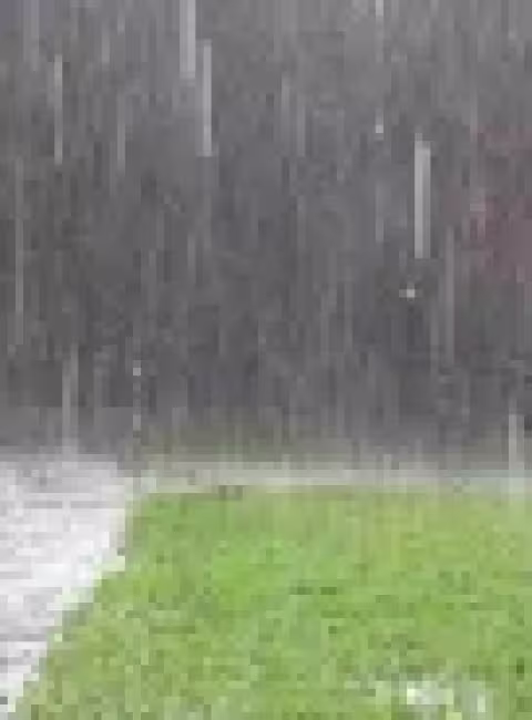 Heavy rain and stormwater runoff outside a Nicholasville KY home after severe weather
