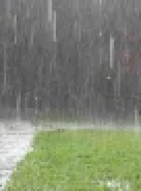 Heavy rain and stormwater runoff outside a Nicholasville KY home after severe weather