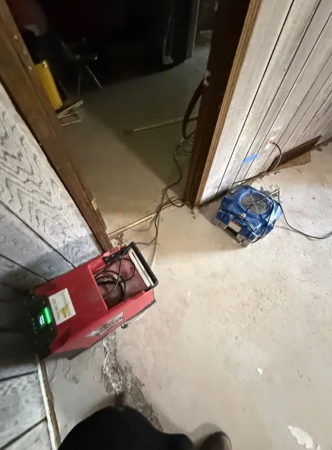 Richmond KY flood damage cleanup with water extraction and structural drying equipment by ServiceMaster Fire and Water Restoration Services