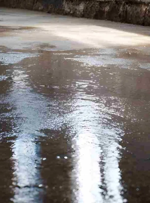 water intrusion from slab leak in basement