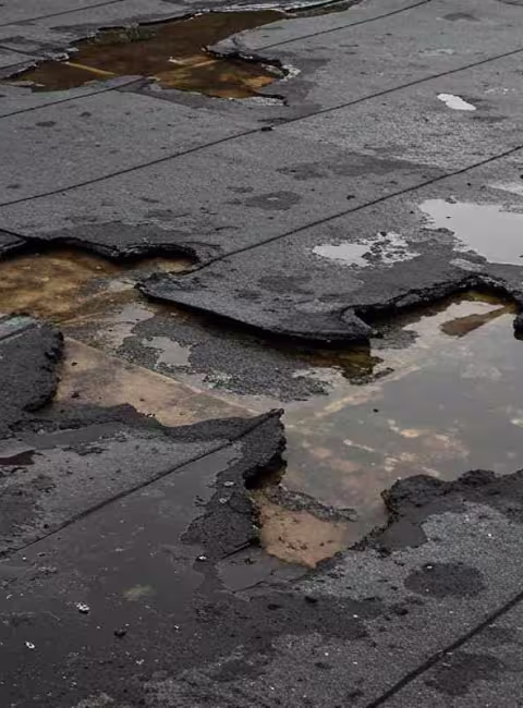storm damaged flat commercial roof