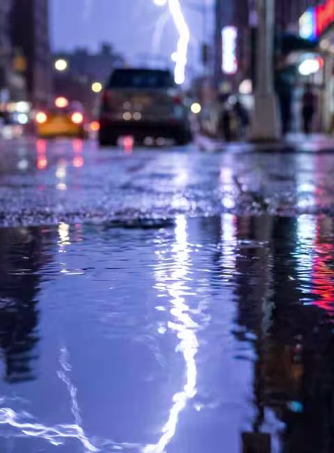 urban street flood among commercial buildings