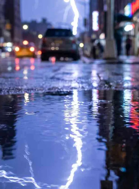 urban street flood among commercial buildings