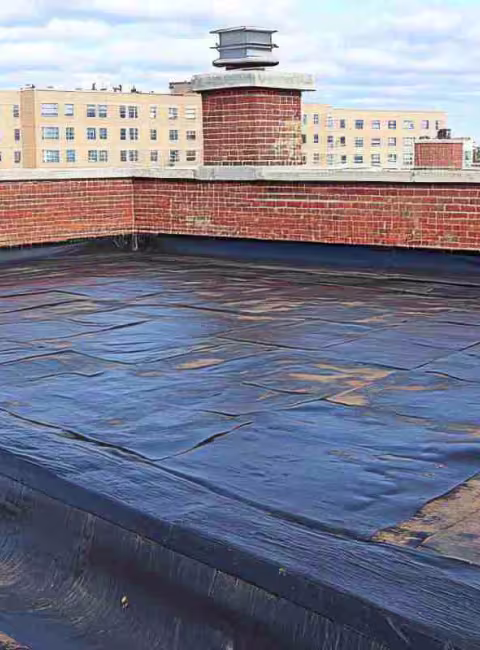 water damage on flat commercial roof
