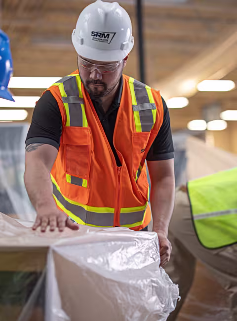 servicemaster restore technicians tarping commercial shelving