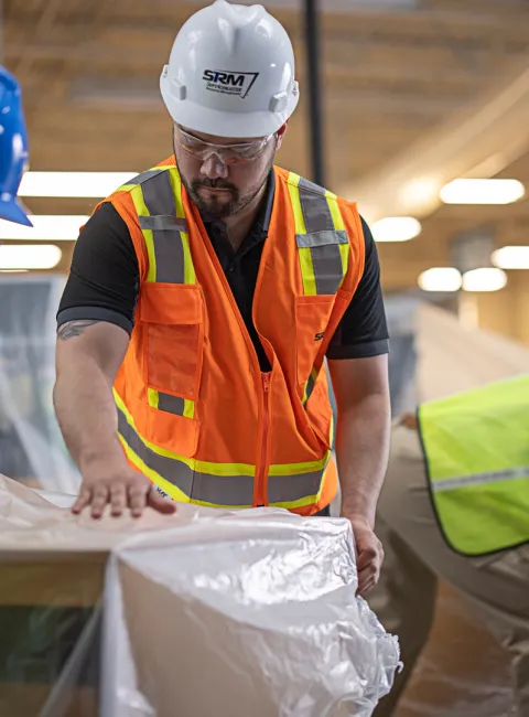 servicemaster restore technicians tarping commercial shelving
