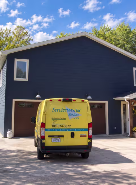 ServiceMaster Van Parked in residential driveway at Northeast Cove, Johnson Lake,NE