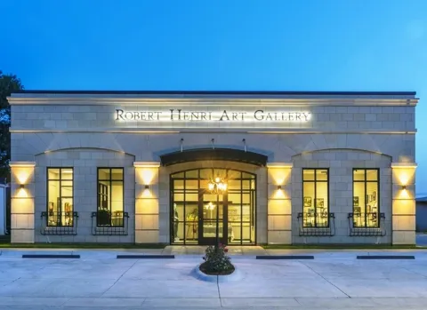 Front exterior of Henri Gallery in Cozad NE at dusk