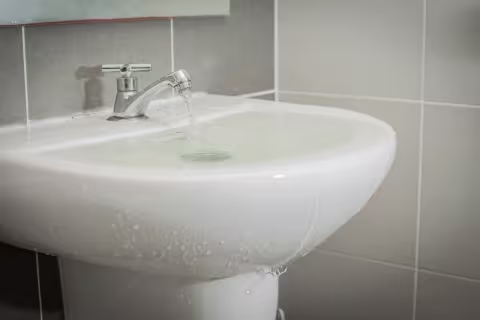 Water overflowing from a running sink in Lexington NE