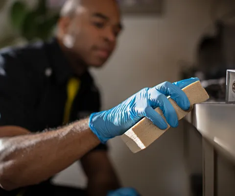 servicemaster restore technician performing soot removal