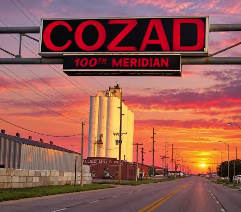 100th Meridian Sign Hanging over Hwy 30 in Cozad, NE facing west