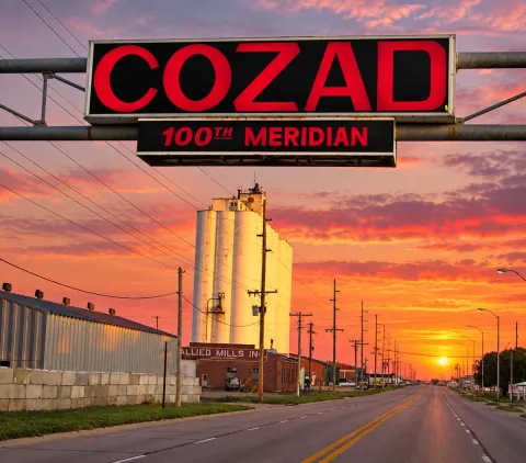 100th Meridian Sign Hanging over Hwy 30 in Cozad, NE facing west