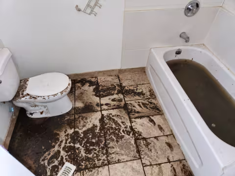 sewage backed up onto bathroom floor and filled up in tub