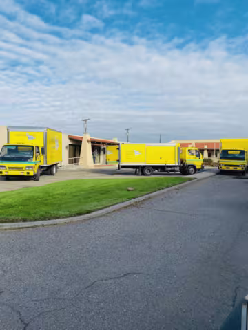 ServiceMaster Restoration by FrontLine Restoration trucks in Farmington