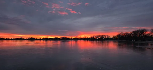 Sunset at Johnson Lake NE near homes served by ServiceMaster of Mid NE