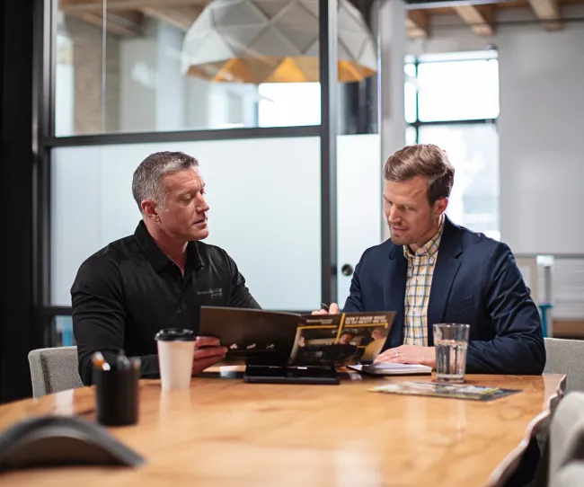 business owner reviewing options with servicemaster rep