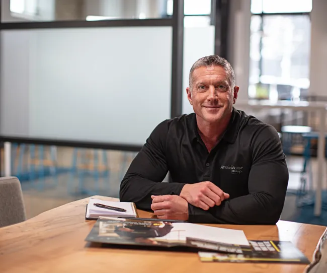 servicemaster commercial service representative at desk