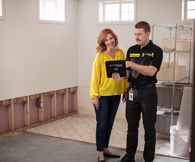 servicemaster technician giving options to customer