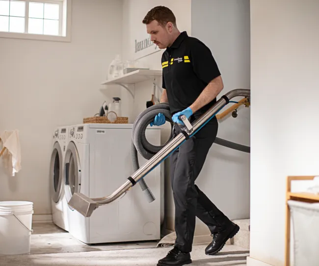 servicemaster restore setting up industrial vacuum for water damage mitigation