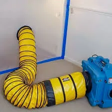 Negative air chamber created with containment plastic and a negative air machine with HEPA filter