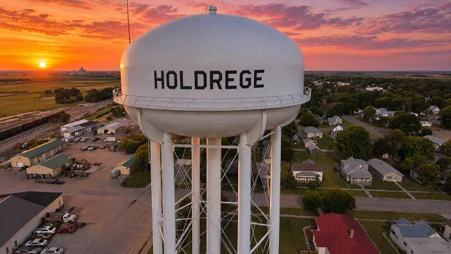 Holdrege, Ne water tower at sunset.