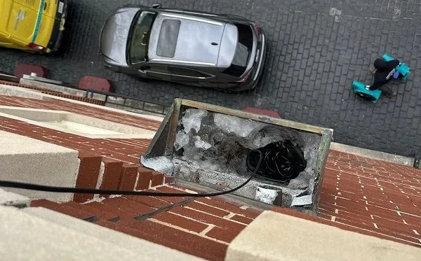 rooftop-patio-leak-in-chicago-due-to-clogged-drain-e1771715220518