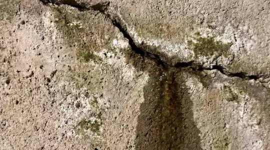 cracked slab with water leaking