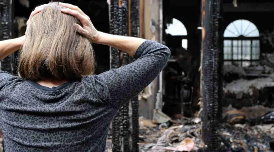 house fire with woman upset