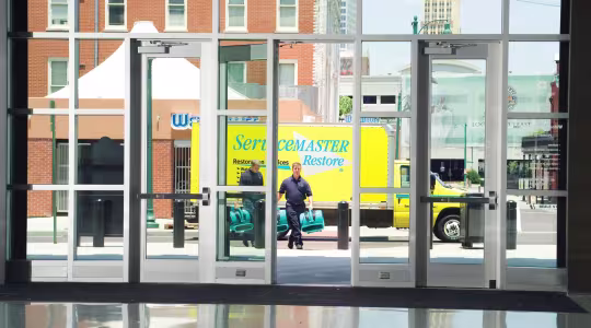 commercial building entrance ServiceMaster Restore truck