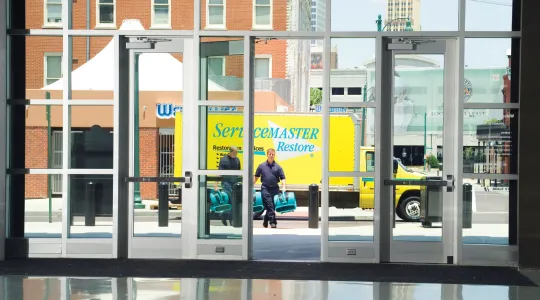 commercial building entrance ServiceMaster Restore truck