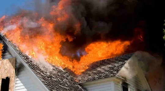 Fire on roof from embers in The Woodlands