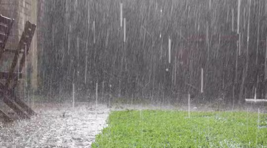 heavy rain outside of a house in Dickenson