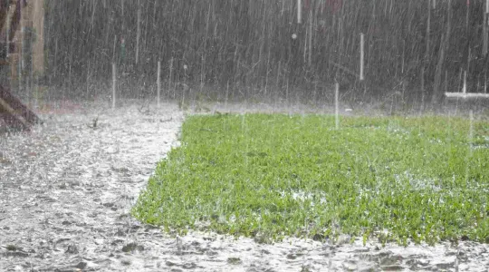 heavy rain outside of a house