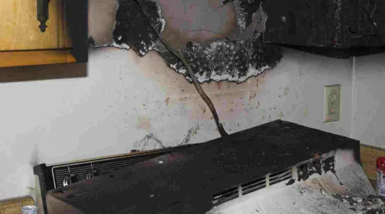 fire damage with lots of soot in a kitchen