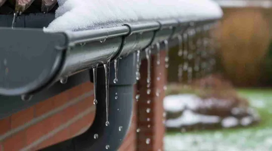 snow melt dripping from roof